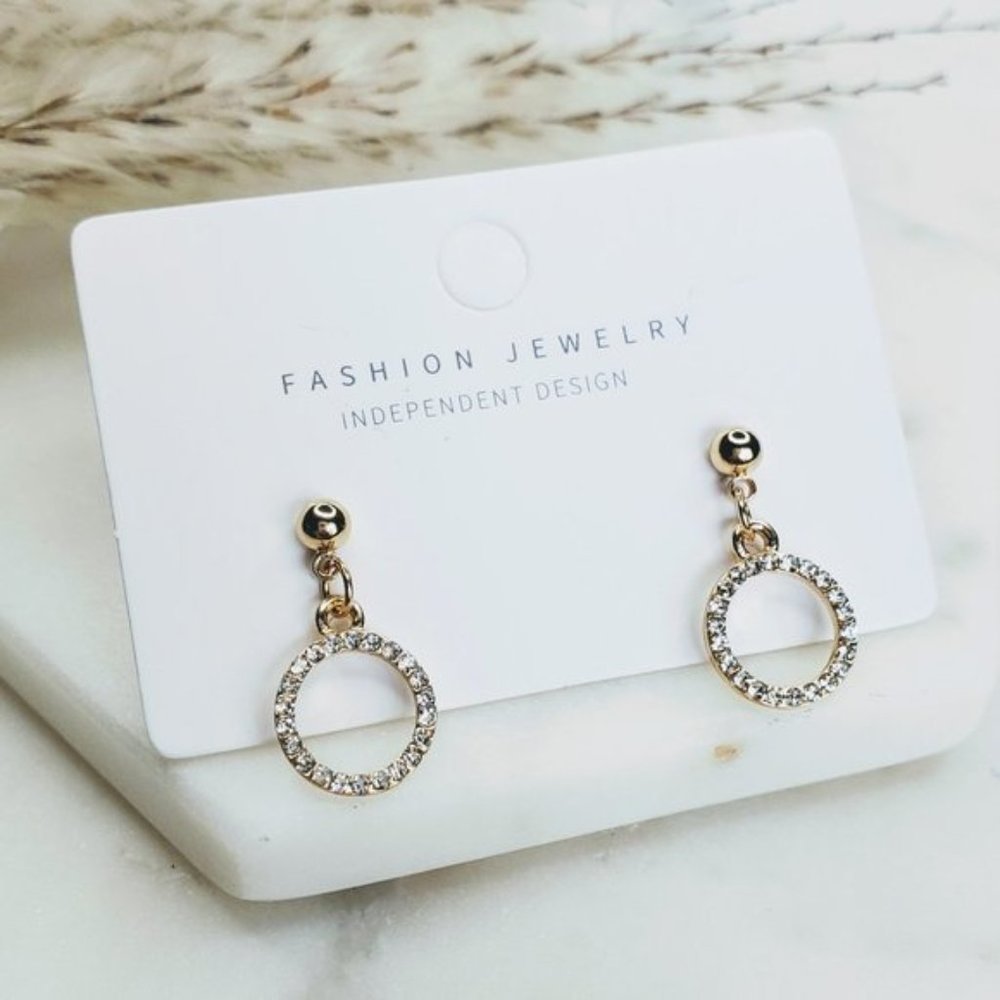 Gold Colored Dangle Earring With Crystal Sphere